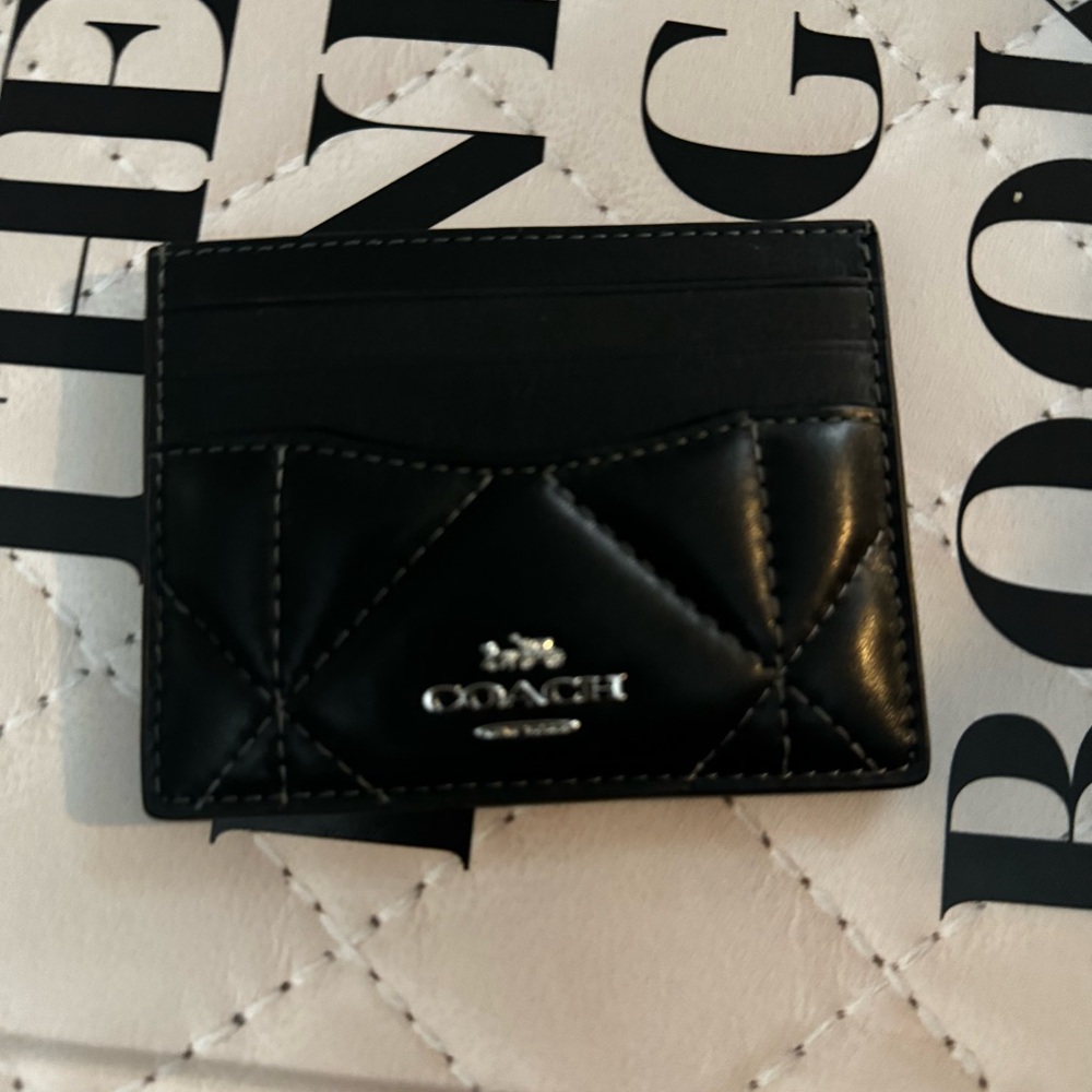 Lightly used. Coach Outlet Quilted Card Case